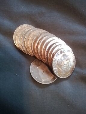 Stack of Silver-Colored Coins Proof Half Dollar